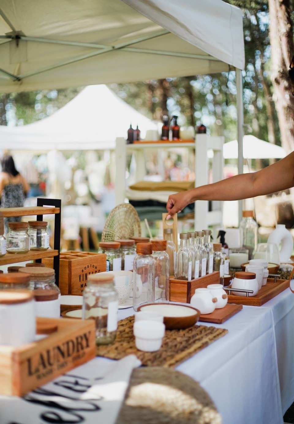 A market stall of refill jars and bottles, with a crate marked Laundry